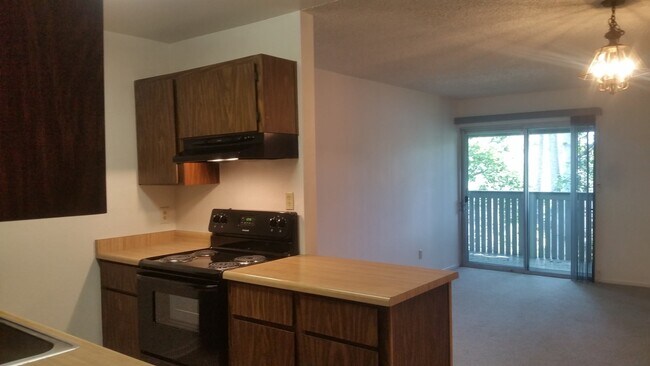Building Photo - MOVE-IN READY! Peaceful 1-Bedroom Top Floo...