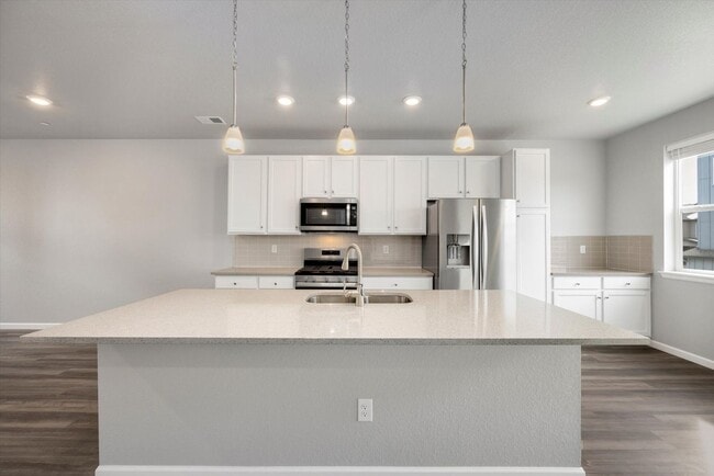 Building Photo - Gorgeous NEW Three Story Townhome with two car attached garage!