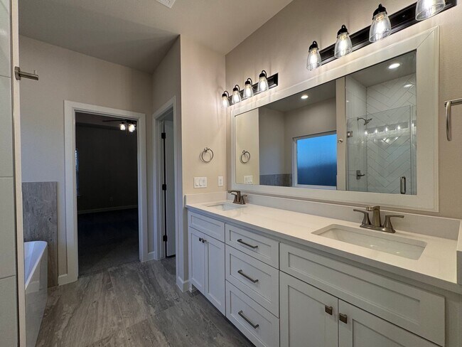 Building Photo - One Month Rent Free - 4 bedrooms - 3 full baths - Brand New