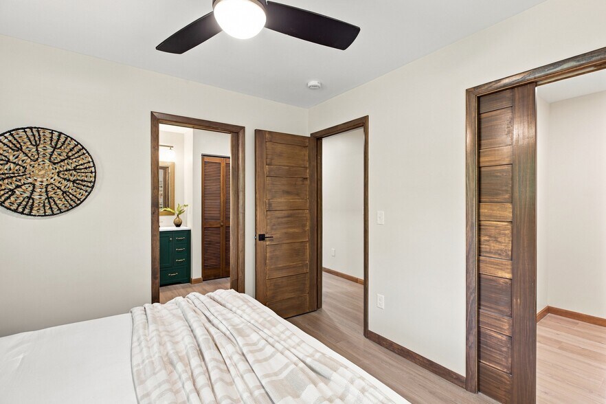 bedroom 2 closet off to right with motion sensor lighting - 9227 Amos Road