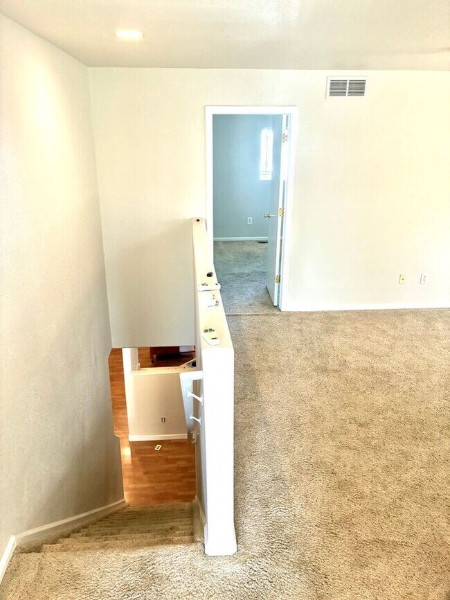 Building Photo - 3 Bedroom, 2.5 Bath Townhome with 2 Car At...