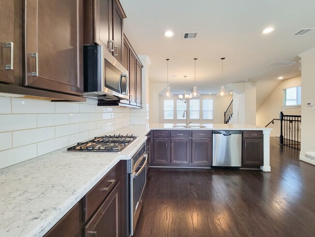 Building Photo - A stunning 4-story home perfectly situated in the heart of Spring Branch!