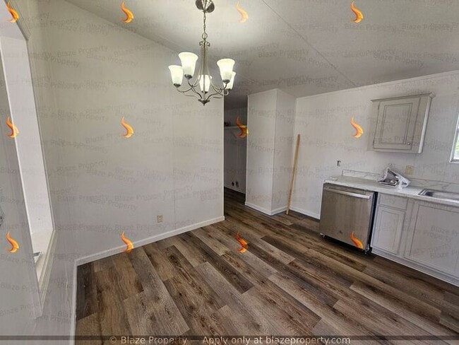 Building Photo - Experience Brand New Comfort in This Renov...