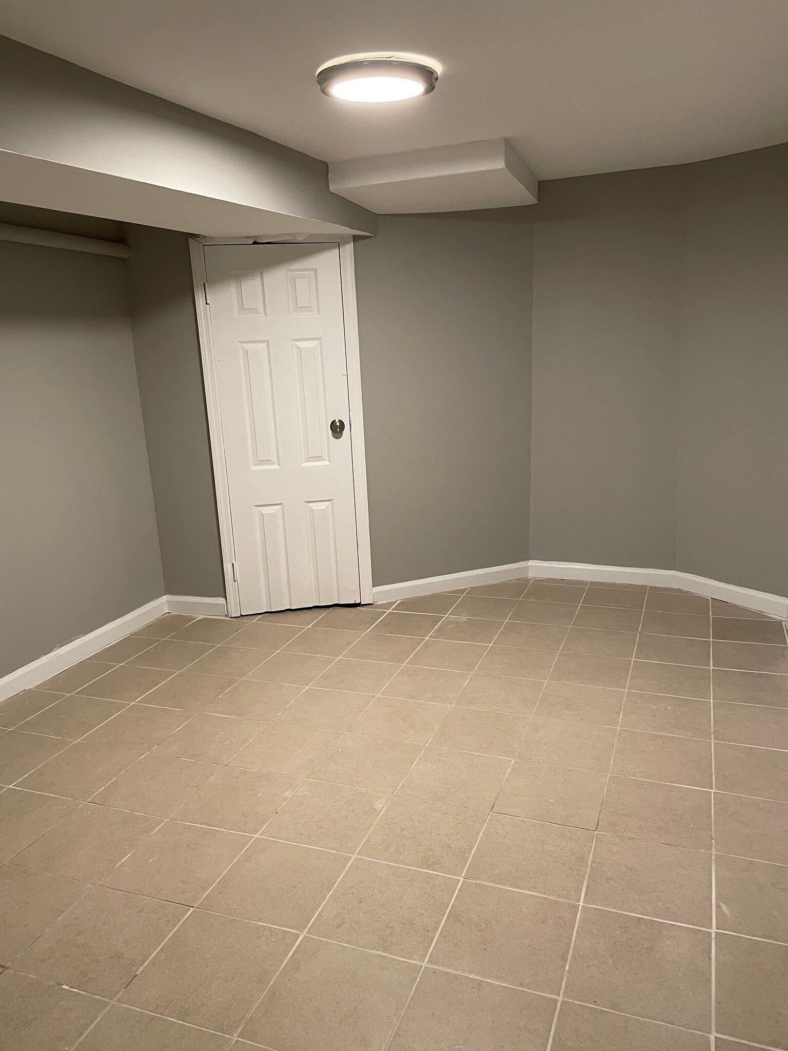 Bedroom is large will tiled floors - 48 Adams St