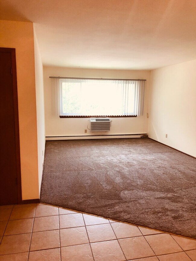 Building Photo - Spruce Court Apartment - Greenfield WI - Call 262-420-0390 to schedule a showing