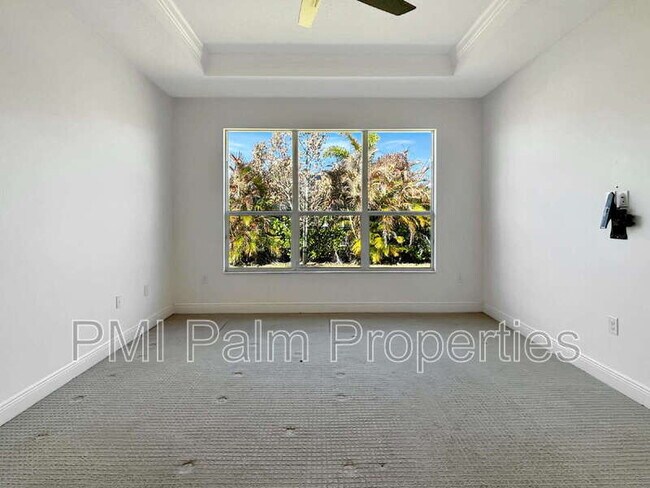 Building Photo - 9870 SW Trumpet Tree Cir