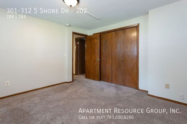 Building Photo - 301-312 S Shore Dr-202