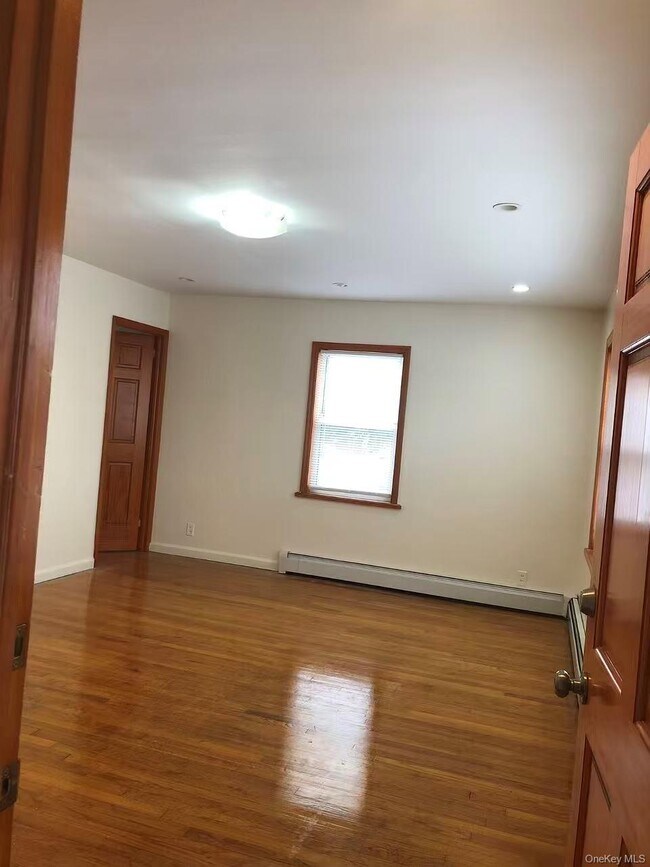 Building Photo - 229-02 Horace Harding Expy