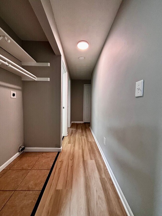 Building Photo - ONE MONTH FREE! Ask us how! A Fresh Start: Renovated 2-Bedroom in Serene Englewood with Washer/Dr...