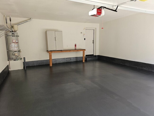 Building Photo - PICTURE PERFECT!  3 BR/3 BA END UNIT CONDO with DIRECT ACCESS 2 CAR GARAGE