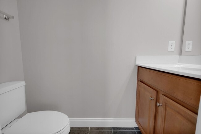 Building Photo - Wonderful craftsman style end-unit townhome