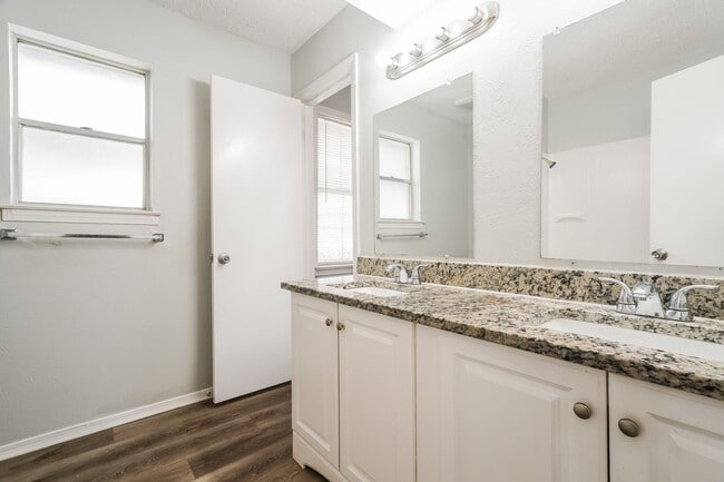 Building Photo - 4 BR/2BA | Updated Single Family Home | Gorgeous hardwoods | Storage attic!