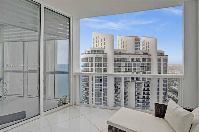 Building Photo - 18201 Collins Ave