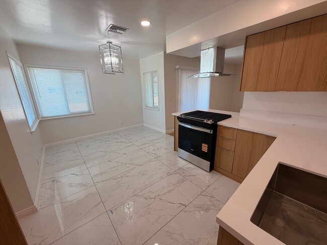 Building Photo - Completely Remodeled, Spacious 2 Bedroom Apartment For Rent w/ Parking!