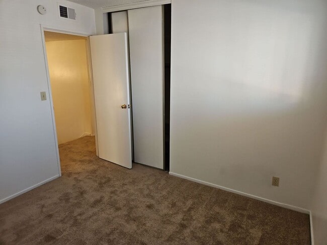 Building Photo - Spacious 4-Bedroom Home with Large Backyard & Covered Patio!