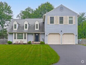 Building Photo - "Stunning 4-Bed Gem with Finished Basement...