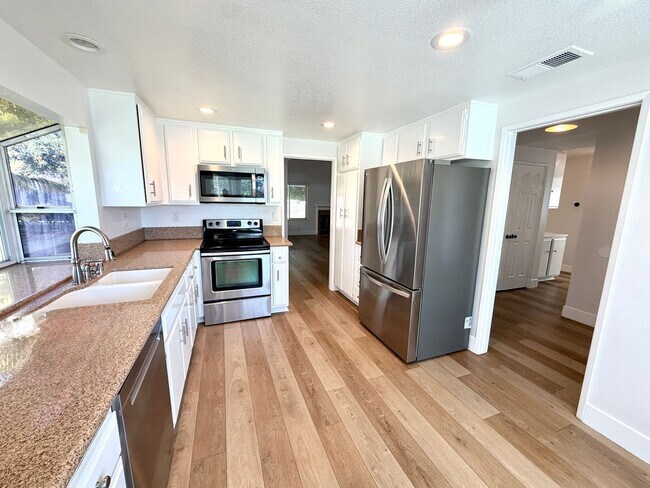 Building Photo - Welcome Home to Prestigious North Upland Living