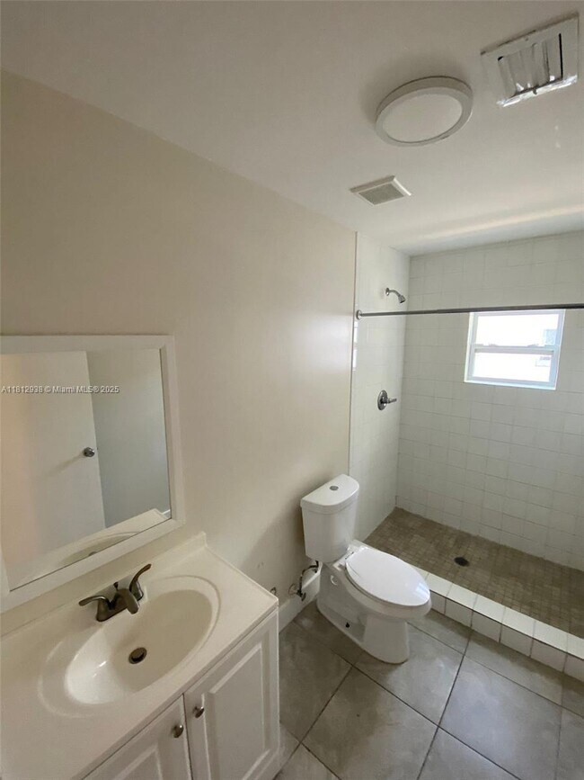 Building Photo - 5447 NW 5th Ct