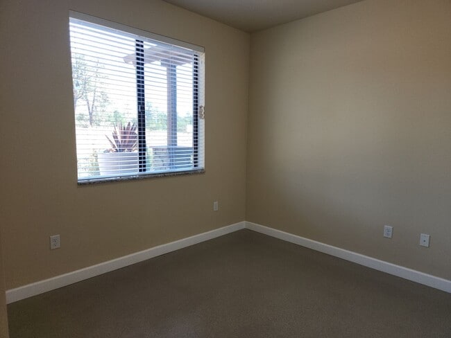 Building Photo - NEW Bison Cove E4 End Unit Now Available