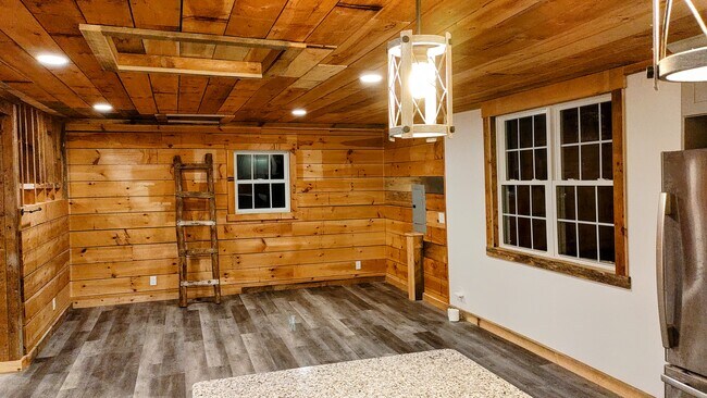 Custom features like trim recycled from former tack room. - 94 Cross Rd