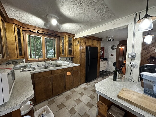Building Photo - Peaceful Waterfront Living: 2-Story Home on River Road with Ample Outdoor Storage & Water Extras!