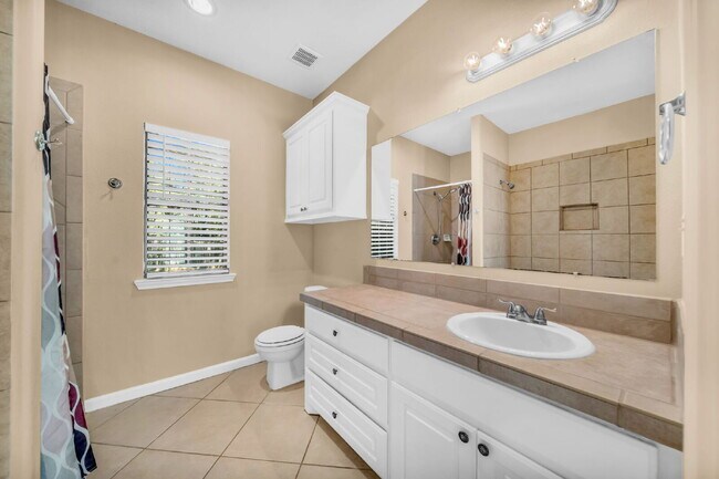 Building Photo - Live just steps from Lake Conroe in this beautifully maintained 3-bedroom, 2-bath home located in...