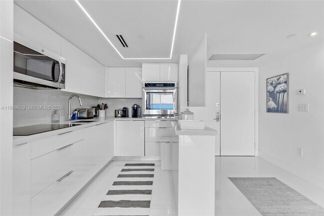 Building Photo - 6301 Collins Ave