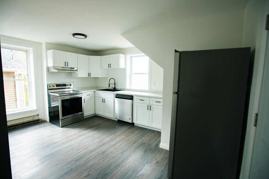 Spacious freshly remodeled kitchen with updated appliances &amp; fixtures. - 4359 Lake Ave