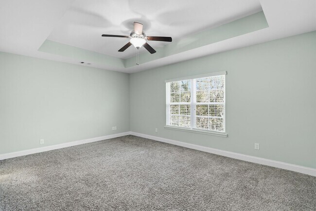 Building Photo - Charming 3 Bedroom Townhome with Private Patio & Fenced Backyard