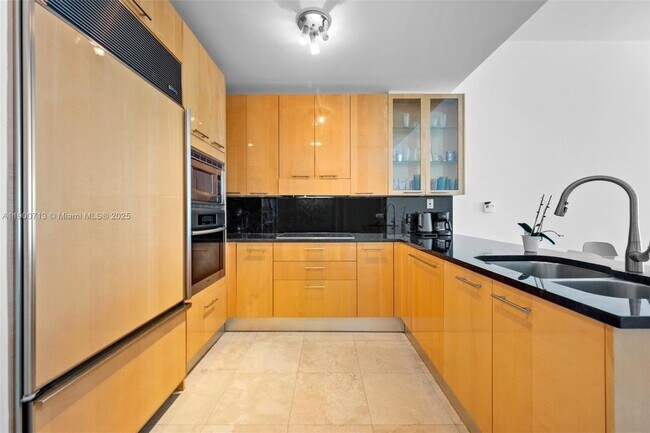 Building Photo - 6799 Collins Ave