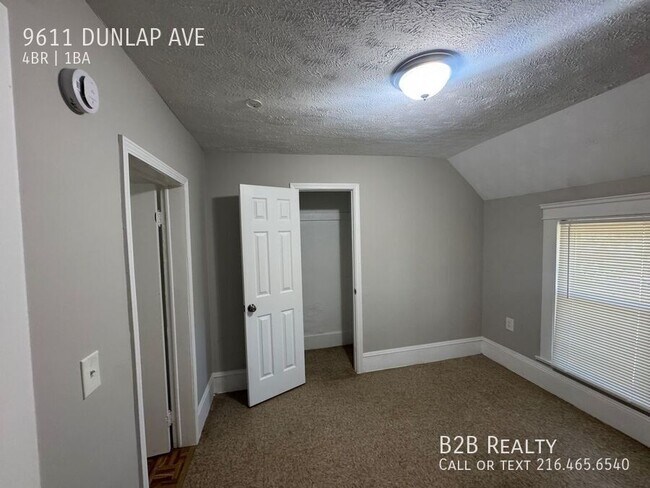 Building Photo - 9611 Dunlap Ave