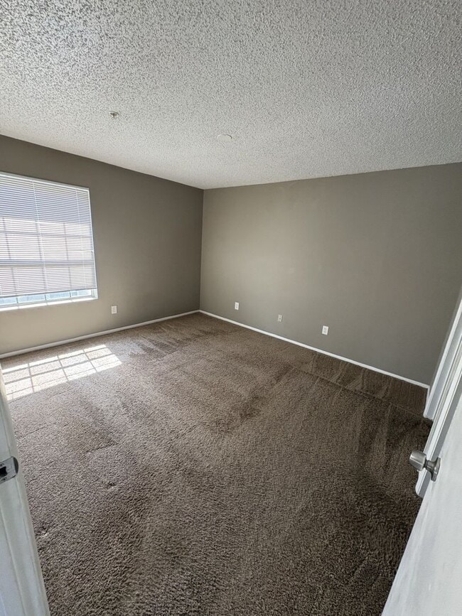 Building Photo - WRAP AROUND PATIO  - LARGE TWO BEDROOM READY NOW!!  $1400 MONTHLY RENT includes water