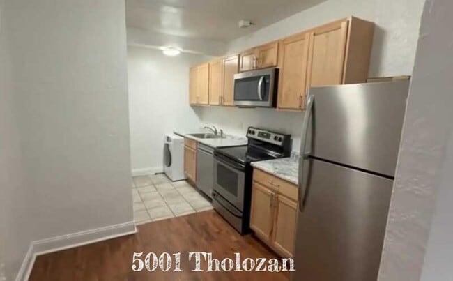 Building Photo - 5001 Tholozan Ave