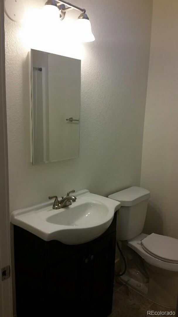 Building Photo - NICE 4-BEDROOM DUPLEX UNIT WITH GARAGE IN SUNNYSIDE! WATER, SEWER & TRASH INCLUDED!