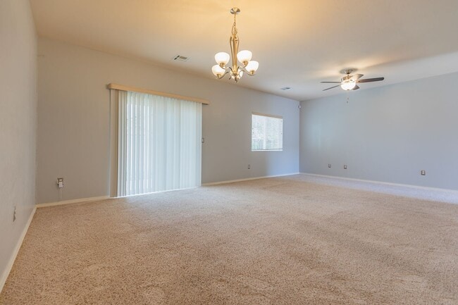 Building Photo - Inviting 4 Bed 2 Bath Home - Solar Panels & In The Golf Course Area!