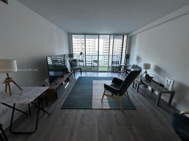 Building Photo - 5600 Collins Ave