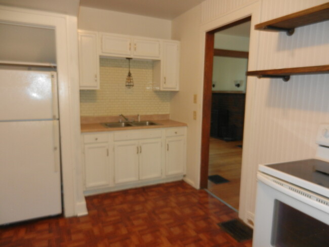 Kitchen with refrigerator /stove - 219 W Locust St