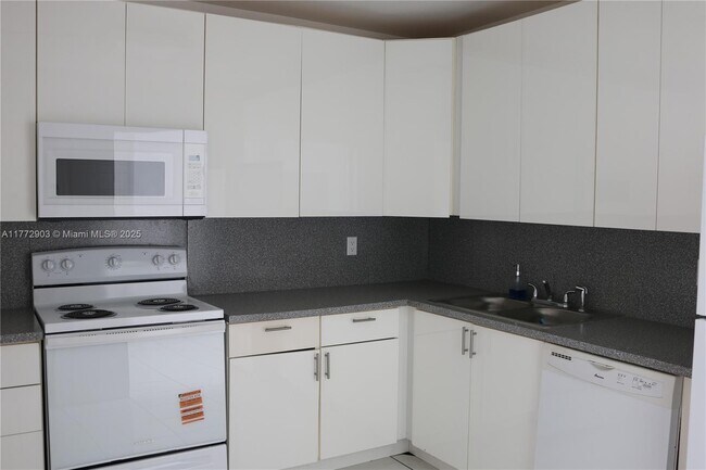 Building Photo - 9801 Collins Ave