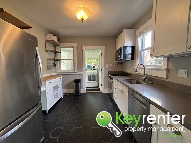 Building Photo - Timeless Charm Meets Modern Living in This...