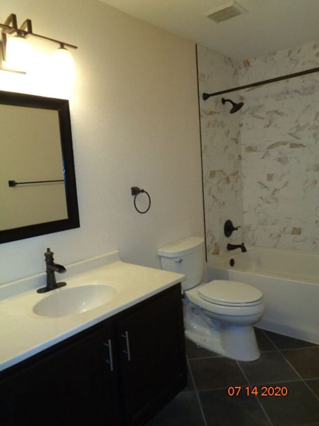 Building Photo - Stunning 2 BR/2 BA Lower Level Condo w/ 1 ...