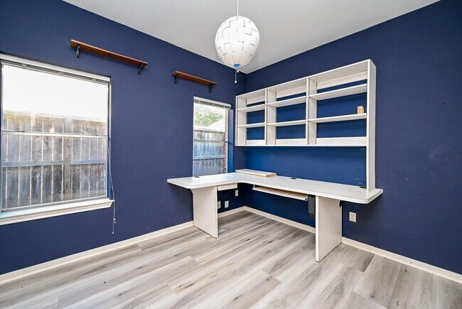 Building Photo - Discover this stunning one-story corner lo...