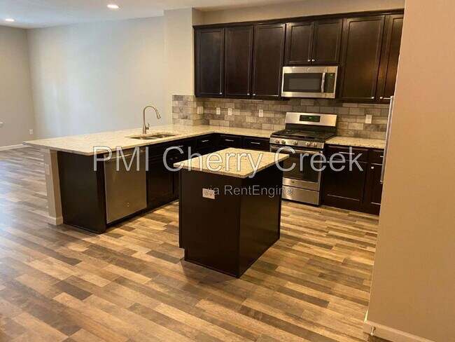 Building Photo - 9008 E Caley Way