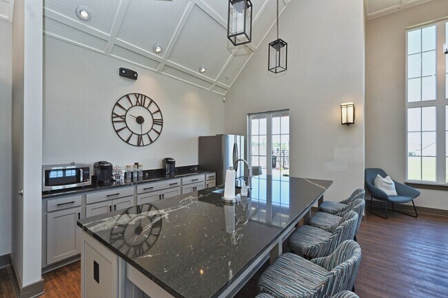 Building Photo - **BE THE LUCKY ONE TO LIVE IN THIS 2024-BUILT END-UNIT TOWNHOME IN A RESORT-STYLE COMMUNITY**