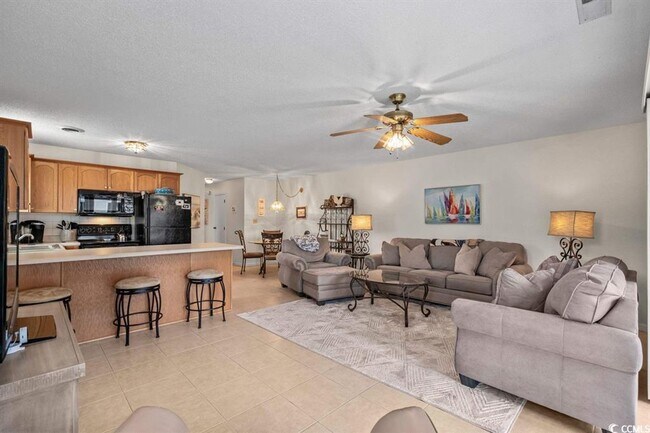 Building Photo - Ground floor, 2 bedroom, 2 bath, end unit- 10 mins to Surfside Beach.