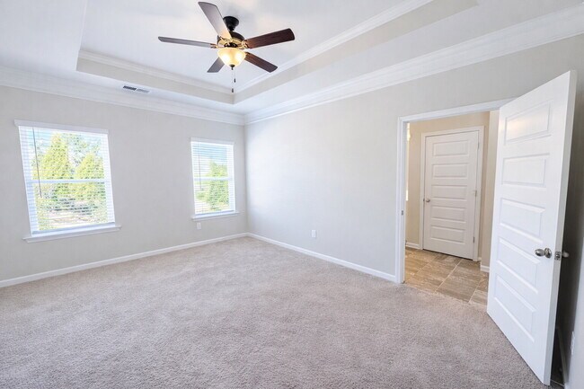 Building Photo - 3-bedroom Townhome in Buford City Schools with Quartz Kitchen, Private Suite, and Walkable Downto...