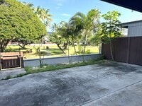 Building Photo - Koko Isle Circle - 3 bedroom, 2 full bath, 1 half bath with two car carport