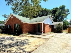 Building Photo - 3/2 No carpet & Fenced yard off Old Waynes...