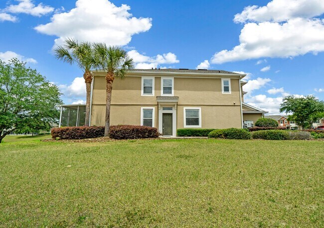 Building Photo - Corner Unit ~ Lake View ~ Maintenance Free...