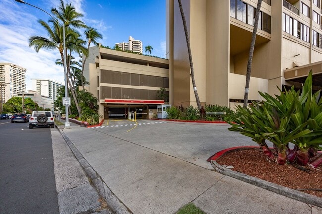 Building Photo - Luxury Waikiki Living with Panoramic Ocean & Sunset Views