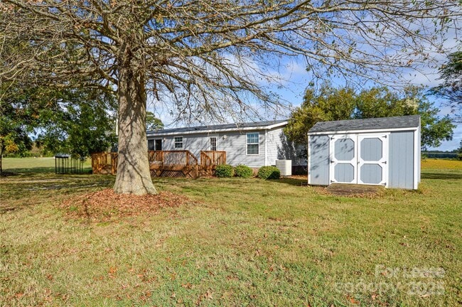 Building Photo - 711 W C J Thomas Rd